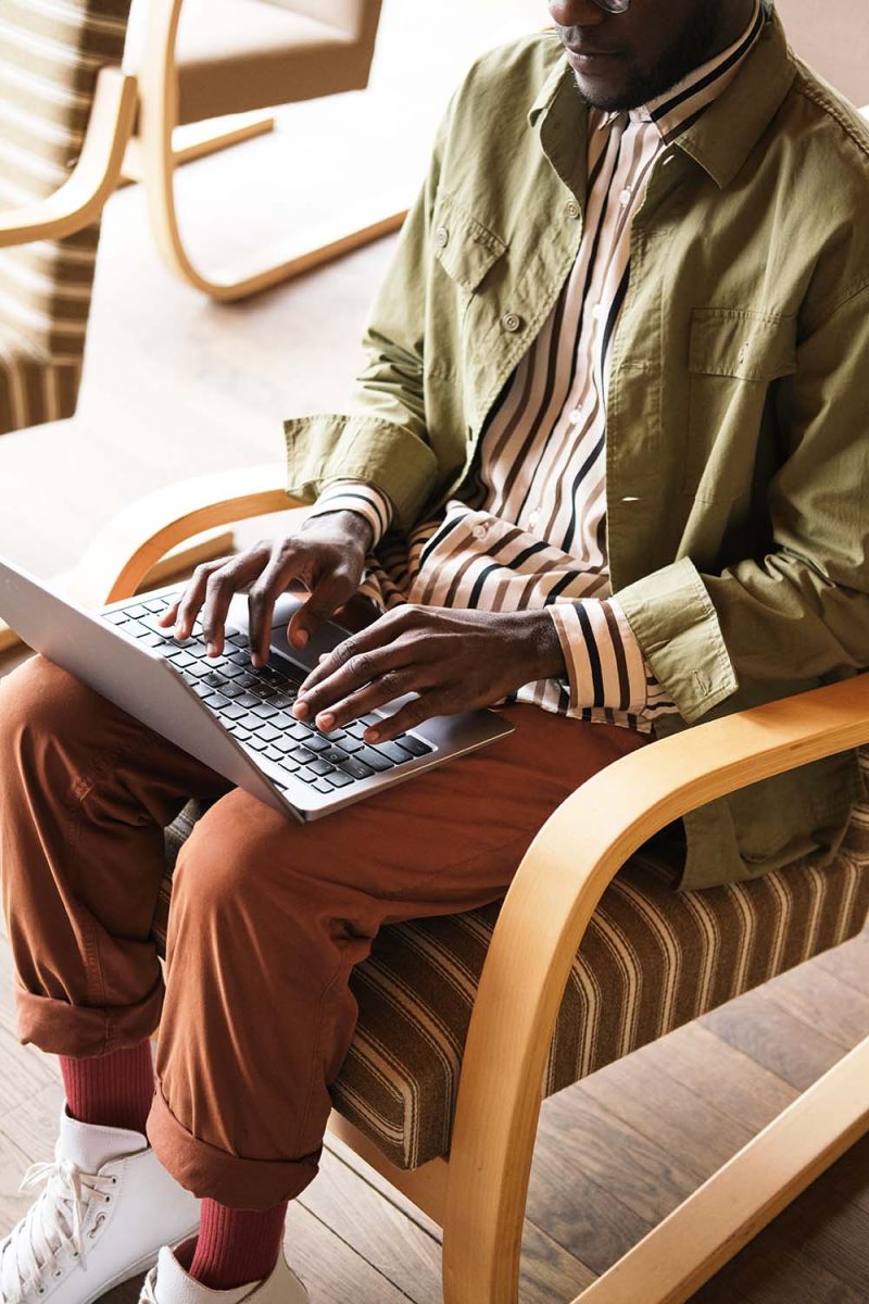 young-man-typing-on-laptop-CXK67C6.jpg